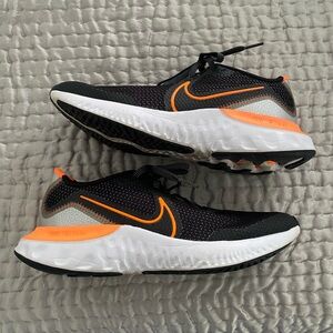 6.5 youth boys or 8.5 women’s Nike renew orange and black shoes